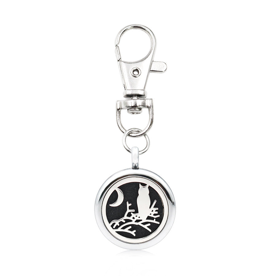 Wholesale Alloy Angel Wings Hollow Aromatherapy Essential Oil Keychain